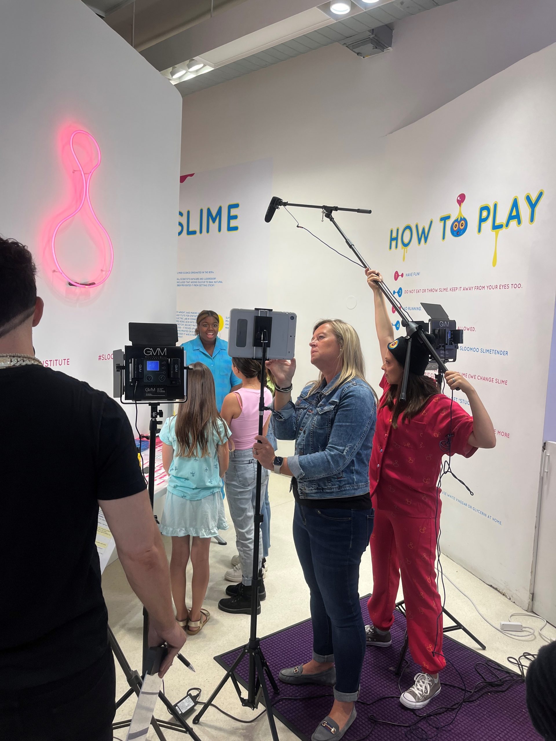 A group of people on set for a production shoot.